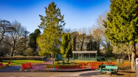 A park setting with benches