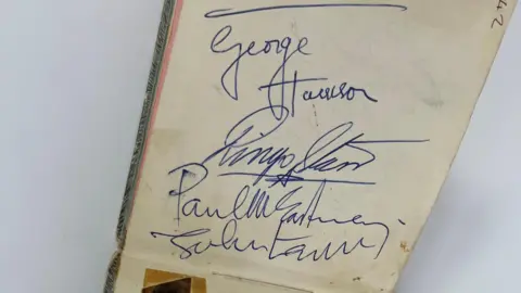 Richard Winterton Auctioneers A collection of signatures from members of the Beatles.