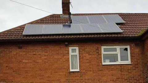 Solar panels on the roof of a council house in Stoke-on-Trent