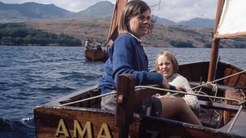 Two girls in the sail boat, Amazon, in a still taken from the 1974 film.