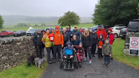 Luke Mortimer  The team walking Pen-y-Ghent with Luke 