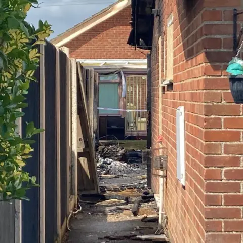 Rubble in a fire damaged house