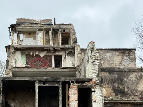 A shattered building in Kharkiv.
