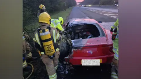 Nottinghamshire Fire and Rescue Service Damaged car on M1