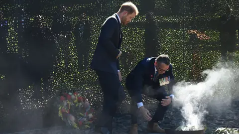 EPA/Shutterstock Harry attends a traditional Smoking Ceremony at the Australian War Memorial in Canberra.