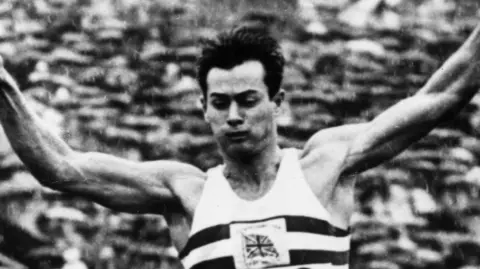 Lynn Davies in action during the long jump