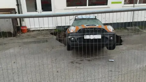 You can see the hole the Mini sits in - it comes halfway across the white rear door of the bakery