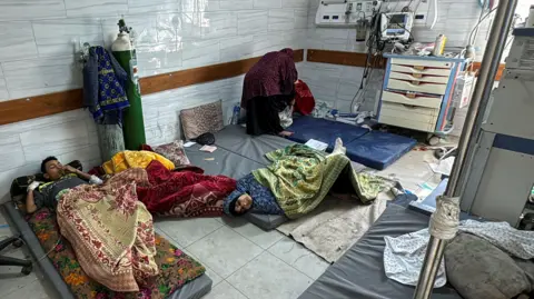 Reuters Wounded Palestinians lie on mattresses on the floor at Kamal Adwan hospital after Israeli forces withdrew from the hospital. 