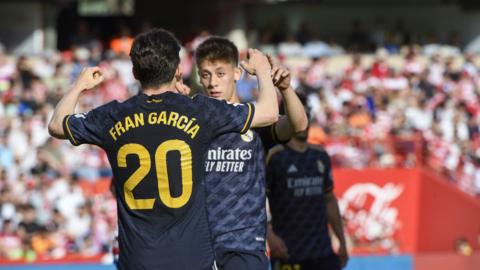 Garcia and Guler celebrate after the side's second goal