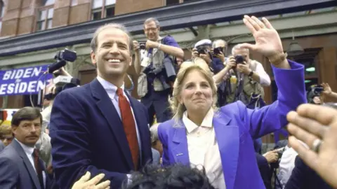 Getty Images Joe Biden standing with his wife Jill in 1987