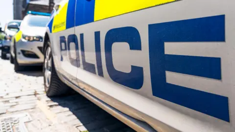 Getty Images Police car parked at an angle