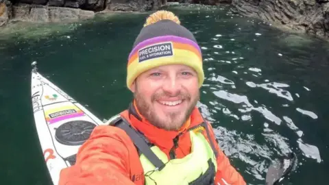Mike Lambert in his kayak