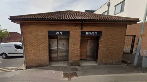 An exterior image of a toilet block in Arnold town centre