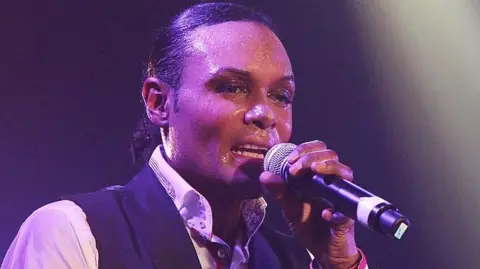 Getty Images Stedman Pearson performing on stage in 2012 at  G-A-Y at Heaven nightclub.