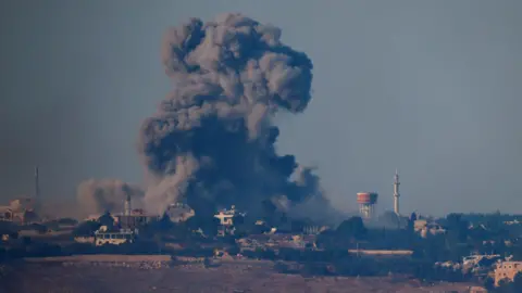 Reuters Smoke billows after an Israeli air strike in southern Lebanon (3 October 2024)