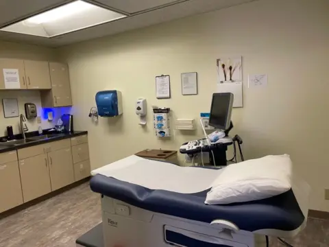 Getty Images A patient room at the Red River Women's Clinic in Minnesota. The clinic relocated from North Dakota due to the state's near-total abortion ban.