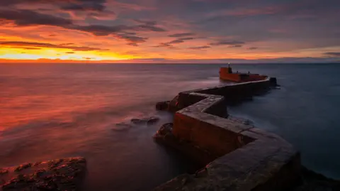 Sunrise at St Monans zig-zag pier in Fife on Christmas Eve.