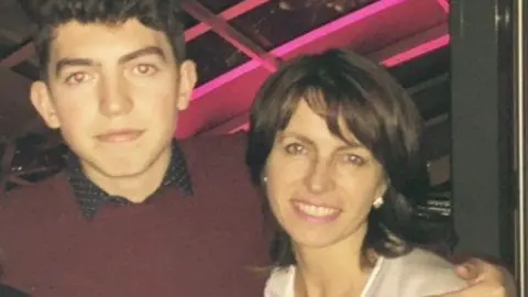 Family handout A young man and his mother.