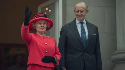 A scene from The Crown, with actors Imelda Staunton as Queen Elizabeth and Sir Jonathan Pryce as the Duke of Edinburgh from part two of the final season of The Crown.