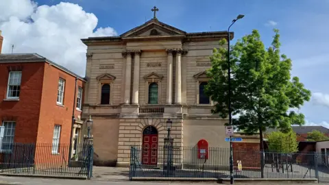 St George's RC Church A relatively modern-looking church building on an urban street.