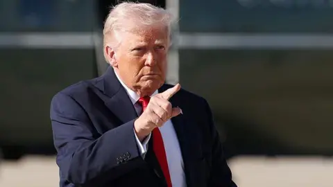 Trump walks to Air Force One on April 11, 2026 at Joint Base Andrews, Maryland