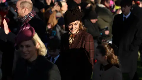 Getty Images Catherine, Princess of Wales, smiles at her daughter Princess Charlotte 