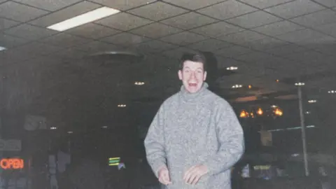 Matthew Smith, Jeffries' colleague, wearing a gray jumper in an old photo