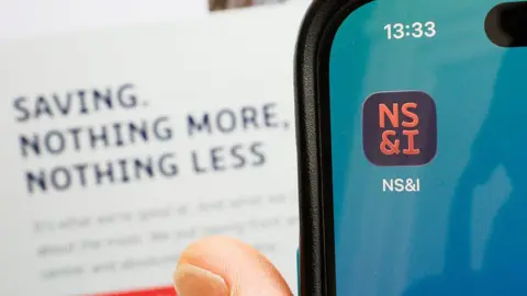 Close up of a phone with the NS&I app