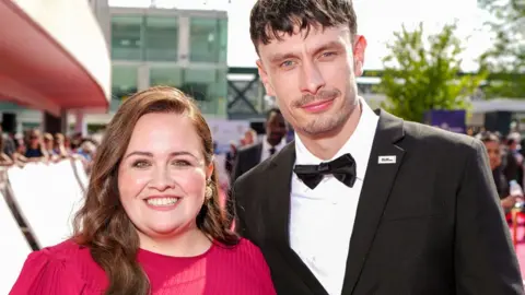 Getty Images Jessica Gunning and Richard Gadd unneurotic  connected  the reddish  carpet astatine  the 2024 BAFTA Television Awards successful  London