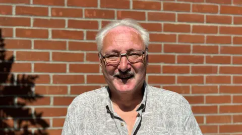 George King/BBC Paul Chamberlain