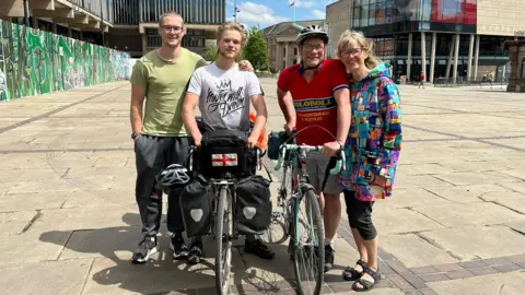 Supplied Jamie and his dad Phil with family