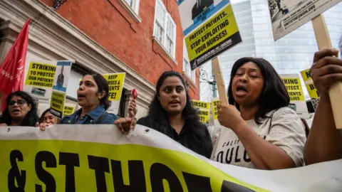 Nurses striking at Guy's & St Thomas' Hospital on 3 September 2024 in London, England.