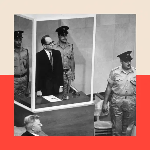 Getty Images Adolf Eichmann stands successful  his bullet-proof solid  cage to perceive  Israel's Supreme Court unanimously cull  an entreaty  against his decease  sentence. With him are 2  equipped  guards. 