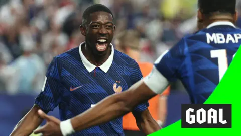Ousman Dembele celebrates scoring the third goal with Kylian Mbappe 