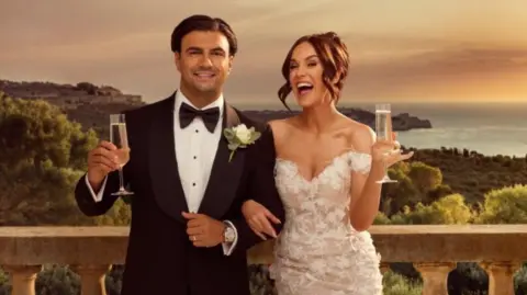 The reality stars on their wedding day, standing on a balcony, holding a glass of champagne