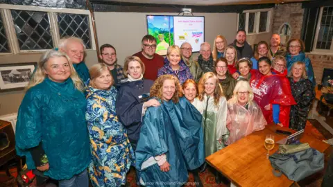 Stars Appeal The group taking part in the trek standing together smiling at the camera