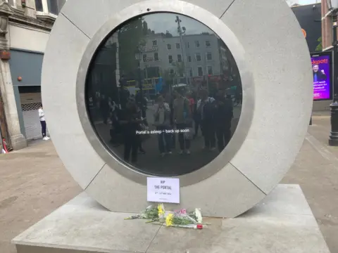 Dublin portal flower tributes
