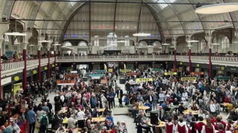 A busy market hall.