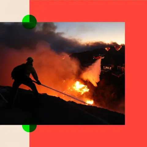 Getty Images A fireman tackles a blaze