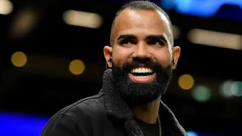 Sandro smiling