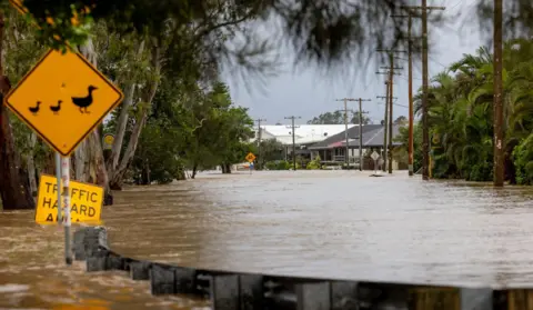 Flood waters submerge a street in New South Wales, Australia.