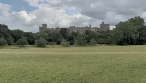 A general view picture of fields in Home Park, which has Windsor Castle in the background.