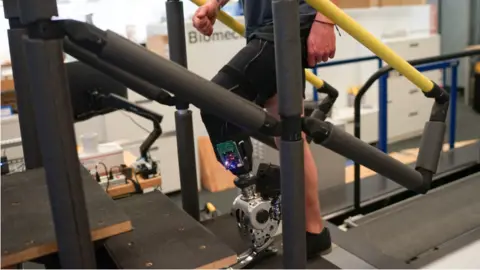Hugh Herr and Hyungeun Song Bionic leg being tested in the MIT study