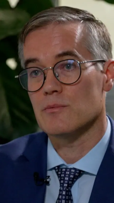 Manchester Airport's managing director Chris Woodroofe speaking to Roger Johnson 