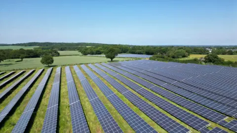 Aerial view of solar panels at a solar farm 