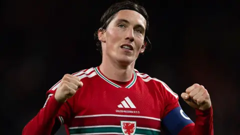 Harry Wilson celebrates scoring for Wales