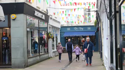BBC People walking in Guernsey town