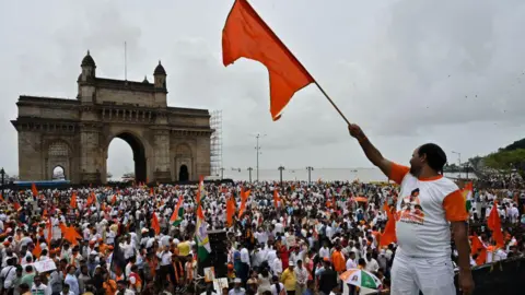 Getty Images MVA party workers gathered at Gateway Of India, during the protest march from Hutatma Chowk to Gateway of India for Chhatrapati Shivaji Maharaj Statue Collapse, on September 1, 2024 in Mumbai, India.