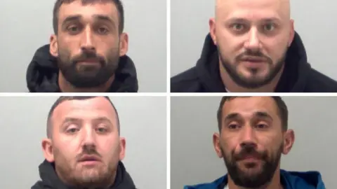 Essex Police A composite image of the four men. Pashk Gjonah is wearing a black hoodie and has dark hair and a beard. Ervin Sadikaj has a shaved head, beard and is wearing a black hoodie. Albest Deda also has a hoodie on and short brown hair. Besjan Mustafaj has a blue jacket on with a hood. He has short dark hair and a beard.