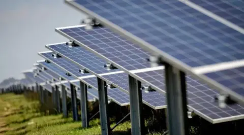 PA Media Solar panels in a field